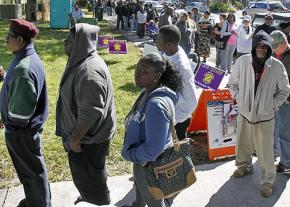 Voters in North Carolina wait in line for hours to cast their ballots